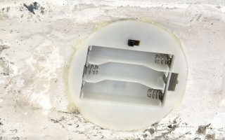 Figurka świąteczna Kominek Chłopiec świecący LED H35 cm